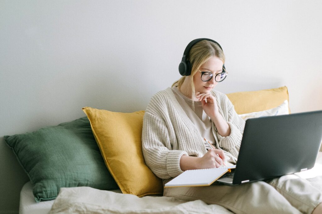 woman taking the best online creative writing classes